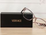 glasses in a box on a wooden table with a white background