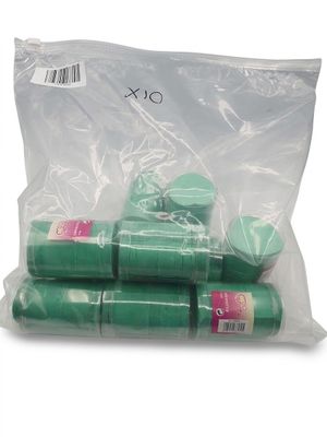 four rolls of toilet paper wrapped in plastic bags