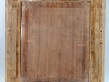 an old picture frame with a picture in it on a white surface
