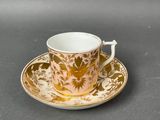 an image of a cup and saucer on a table