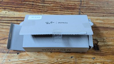 a cardboard box that is sitting on a wooden table