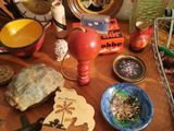 a wooden table topped with various items on top of it