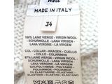 a close up of a label on a sweater that says hermes paris made in italy