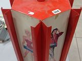 a red umbrella that has a picture of a woman on it