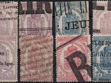 an image of a collection of old postage stamps on a black background