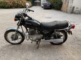 a motorcycle that is parked in a parking lot