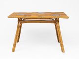 a bamboo table with a tile top and legs