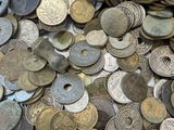 a lot of coins that are sitting on a table