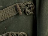 a close up of a military uniform with a belt