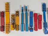 a lot of different types of toy trains on the table