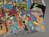 a lot of comic books sitting on a table