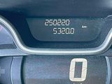 a close up of a speedometer on a car ' s dashboard