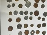 a picture of a display of coins in a glass case