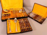a case with silverware in it on a table
