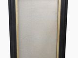 a black and gold picture frame with a white background