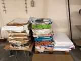 a pile of papers sitting on a table in a room