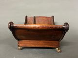 pair of antique wooden magazine racks on casteors