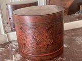 a wooden box sitting on a table in a room