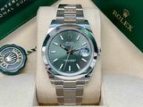 a rolex watch that is on display in a box