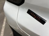 a close up of a sticker on the side of a car