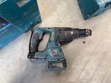a cordless drill that is sitting on the floor
