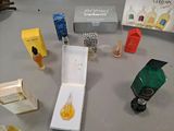 a lot of different perfumes on the table
