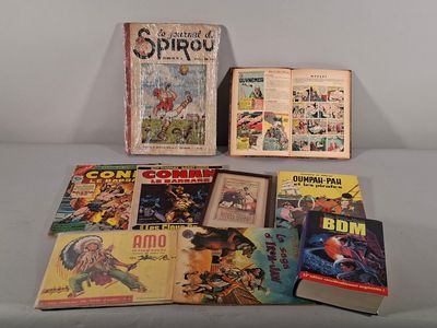un grand nombre de bandes dessinées sur une table