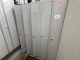 several lockers are lined up in a row in a room