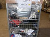 a cart with a lot of items in it in a warehouse