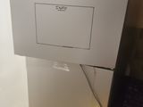 a picture of a white refrigerator with stickers on it