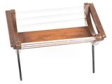a wooden bench with a glass top on a white background