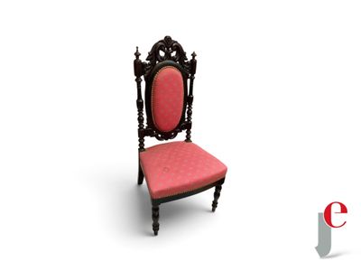 an image of a red chair with a black frame and a red seat