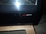 a television that is sitting on a wooden stand