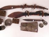 an image of a collection of various items including a knife and other items