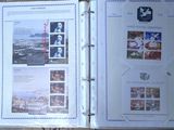 a binder with pictures of people on it sitting on a table