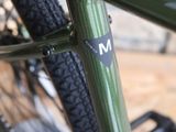 a close up of a bike with a sticker on it
