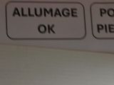 a close up of a sign on a refrigerator door