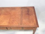an image of a wooden table with a drawer on top of it