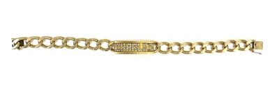 a close up of a gold bracelet on a white background