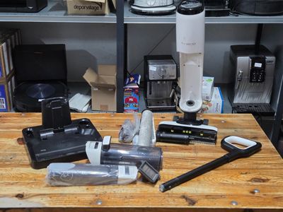 a wooden table with a bunch of items on top of it