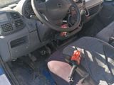 a car that has a steering wheel and a seat in it