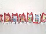 a lot of small toys that are lined up together