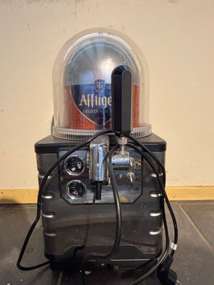 an image of a blender with a bottle on top of it