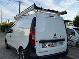 a white van parked on the side of the road