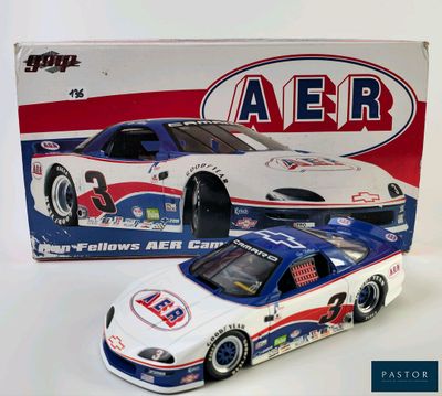 a close up of a toy car in front of a box