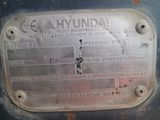 a close up of a metal plate with the words hyundai on it