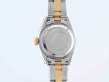 an image of a close up of a wrist watch on a white surface