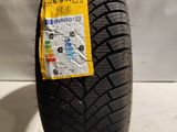a close up of a tire with a sticker on it