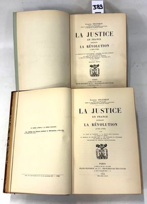 two open books sitting on top of a table next to each other