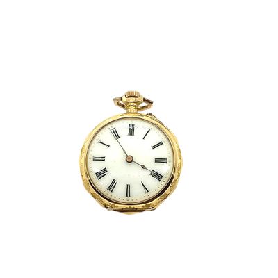 a gold pocket watch with roman numerals on the face